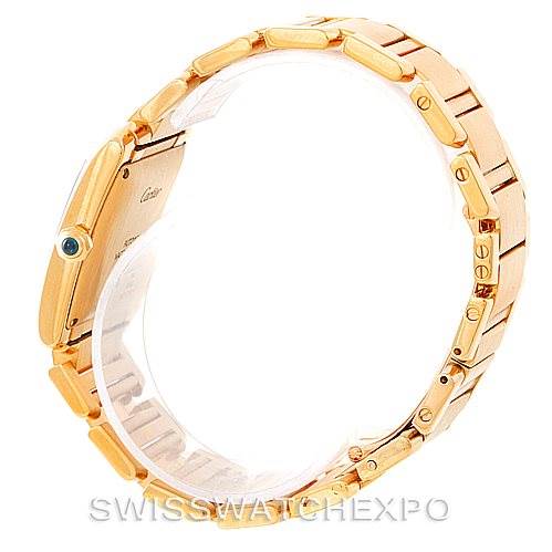 This image shows a side view of the Cartier Tank Francaise W50001R2 Men
s Yellow Gold Silver Dial W50001R2 Men
s Yellow Gold Silver Dial watch, highlighting its gold bracelet and side profile with a cabochon crown.