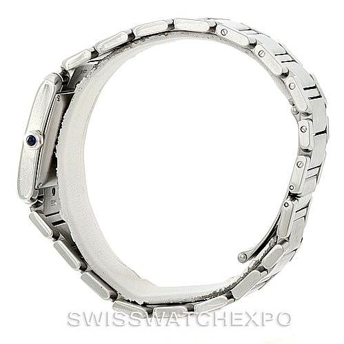 The image shows a Cartier Tank Francaise W51002Q3 Men's Stainless Steel Silver Dial W51002Q3 Men's Stainless Steel Silver Dial watch from a side angle, highlighting its metal bracelet and crown with a blue cabochon.