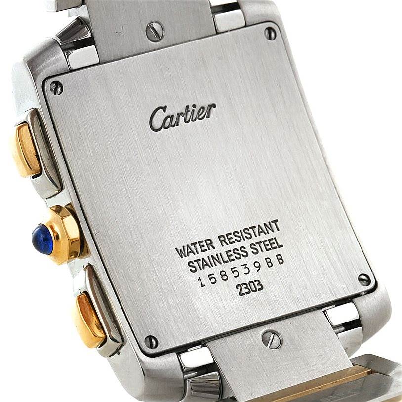 This image shows the back case of a Cartier Tank Francaise W51004Q4 Men's Steel and Gold (two tone) Silver Dial W51004Q4 Men's Steel and Gold (two tone) Silver Dial watch angled to display the water-resistance rating and serial number.
