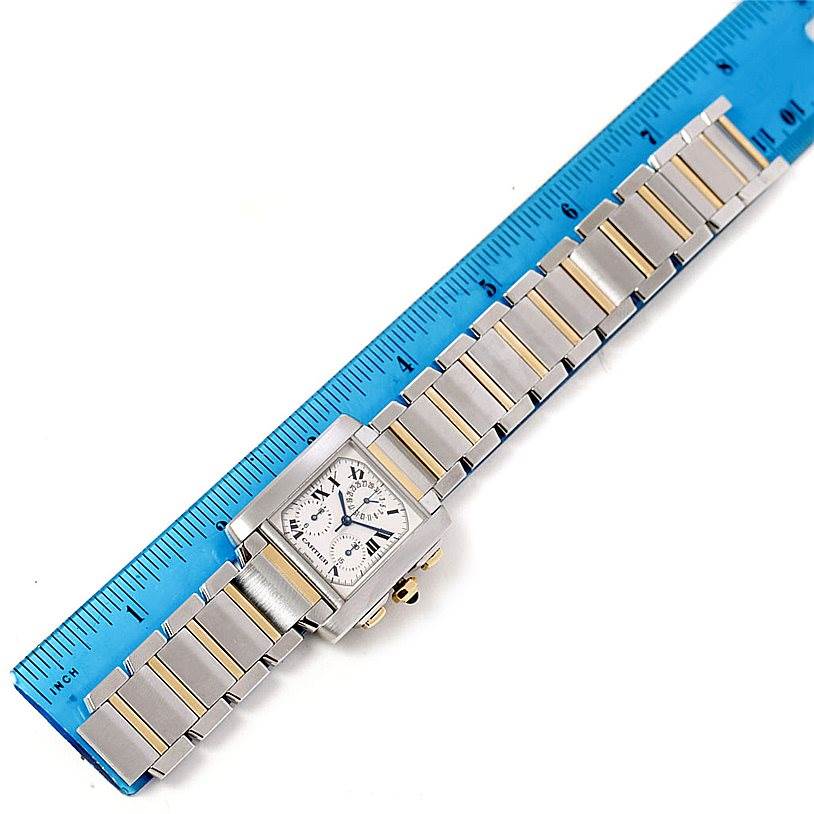 The image shows a top view of a Cartier Tank Francaise W51004Q4 Men's Steel and Gold (two tone) Silver Dial W51004Q4 Men's Steel and Gold (two tone) Silver Dial watch, highlighting the bracelet and the rectangular watch face.