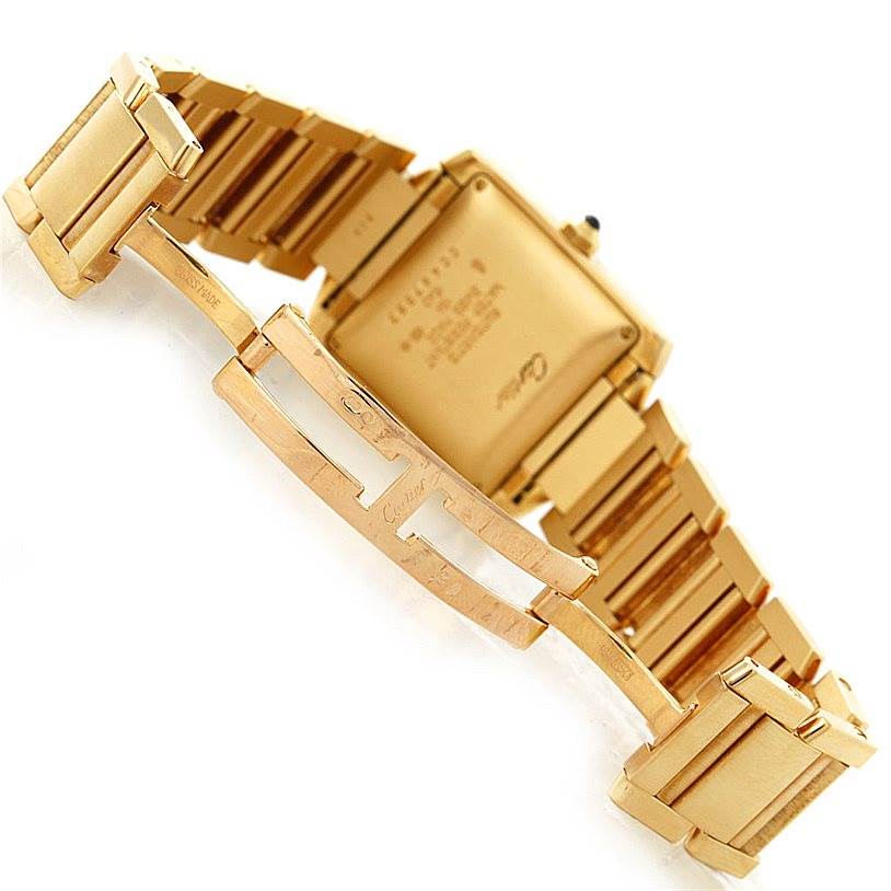 The image shows the back and clasp of the Cartier Tank Française watch.