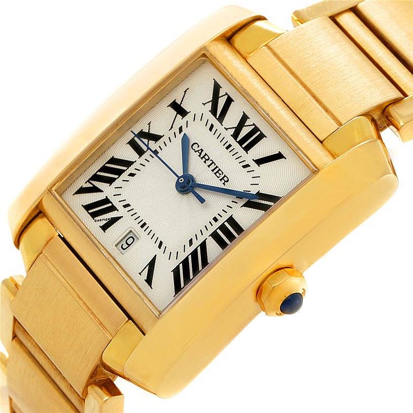 This image shows a close-up angled view of the Cartier Tank Francaise W50001R2 Men
s Yellow Gold Silver Dial W50001R2 Men
s Yellow Gold Silver Dial watch, highlighting the face, hands, crown, and part of the bracelet.