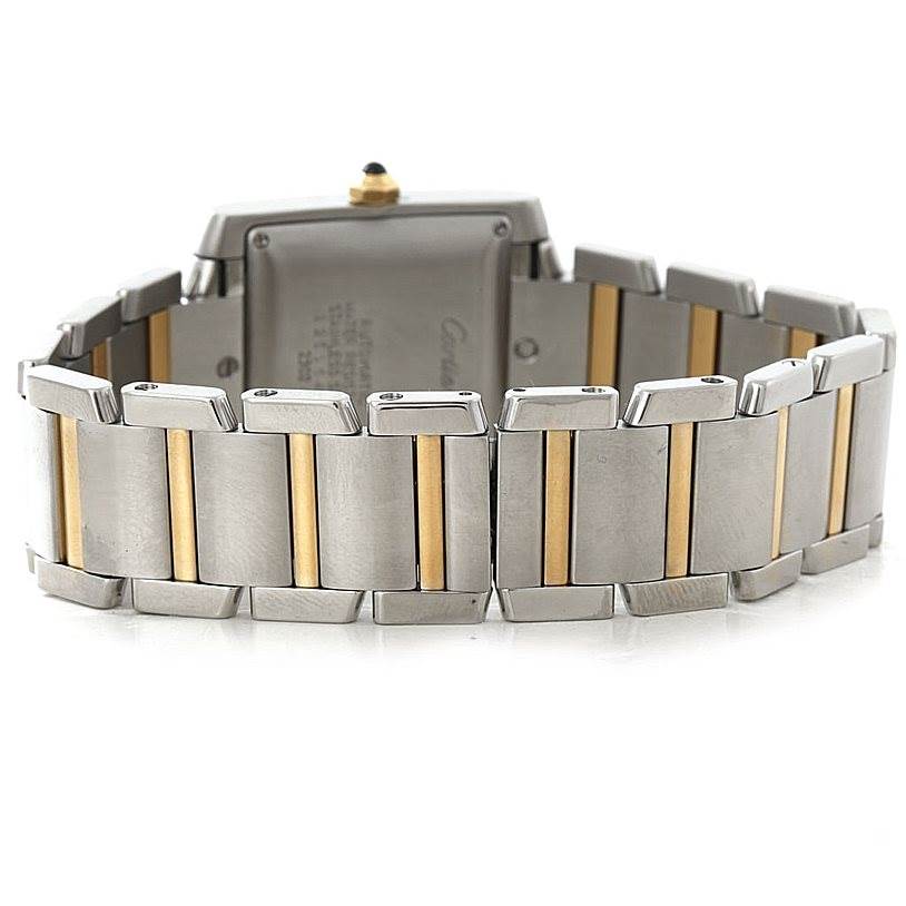 The image shows the back and bracelet of a Cartier Tank Francaise W51005Q4 Men
s Steel and Gold (two tone) Silver Dial W51005Q4 Men
s Steel and Gold (two tone) Silver Dial watch, highlighting its two-tone links.