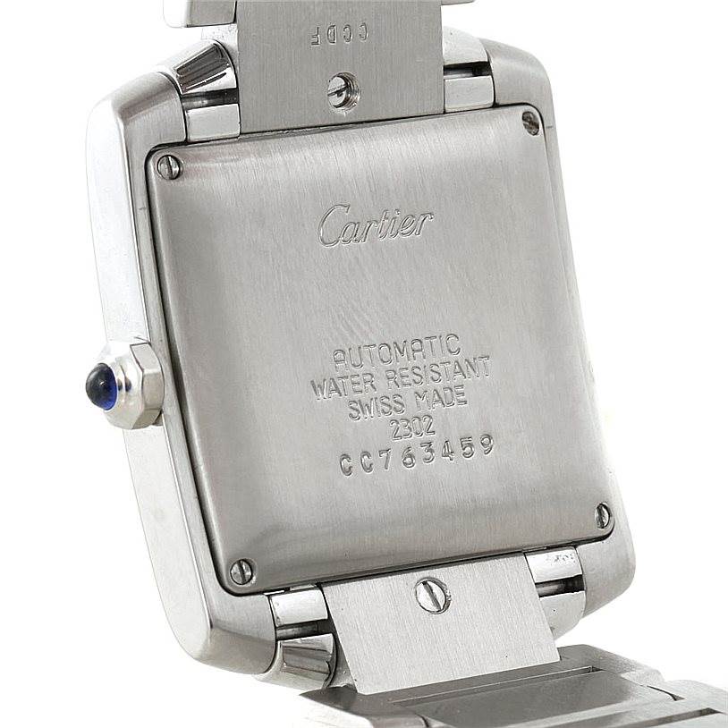 This image shows the back case of a Cartier Tank Francaise W51002Q3 Men
s Stainless Steel Silver Dial W51002Q3 Men
s Stainless Steel Silver Dial watch, displaying the brand engravings and serial number.