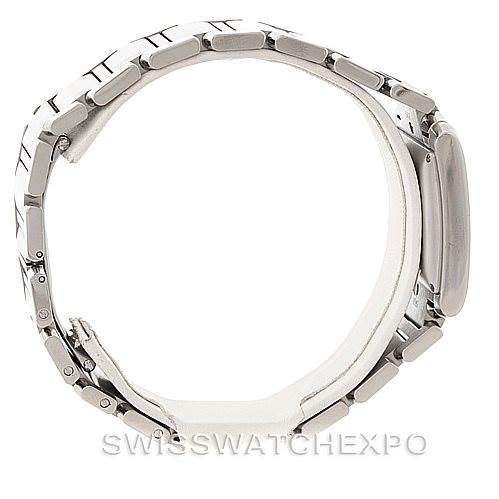 The image shows a side view of the Cartier Tank Francaise W51002Q3 Men
s Stainless Steel Silver Dial W51002Q3 Men
s Stainless Steel Silver Dial watch, highlighting its metal bracelet and case.