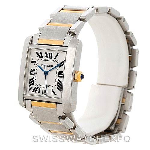 The Cartier Tank Francaise W51005Q4 Men's Steel and Gold (two tone) Silver Dial W51005Q4 Men's Steel and Gold (two tone) Silver Dial watch is shown at a three-quarter angle, displaying the face, bracelet, and the crown with its blue gem.