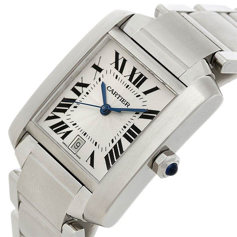 This image shows a close-up, angled view of a Cartier Tank Française watch, highlighting the face, bracelet, and crown.