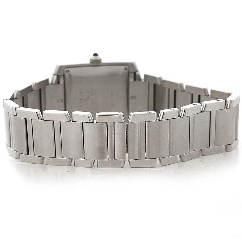 The image shows the back view of a Cartier Tank Francaise W51002Q3 Men
s Stainless Steel Silver Dial W51002Q3 Men
s Stainless Steel Silver Dial watch, highlighting its metal bracelet and case back.