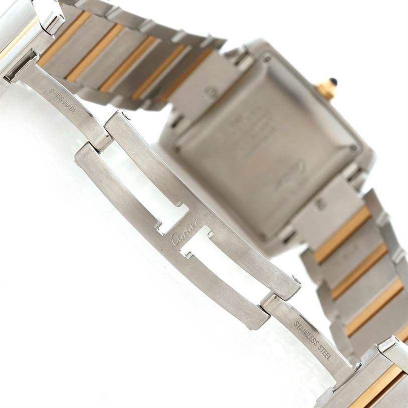 The image shows the back of the Cartier Tank Francaise W51005Q4 Men
s Steel and Gold (two tone) Silver Dial W51005Q4 Men
s Steel and Gold (two tone) Silver Dial watch, highlighting its stainless steel and gold bracelet.