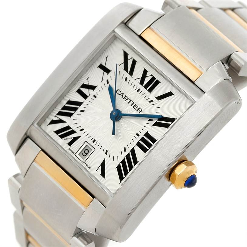 The Cartier Tank Francaise W51005Q4 Men
s Steel and Gold (two tone) Silver Dial W51005Q4 Men
s Steel and Gold (two tone) Silver Dial watch is shown at an angle, highlighting its dial, crown, and a portion of the bracelet.