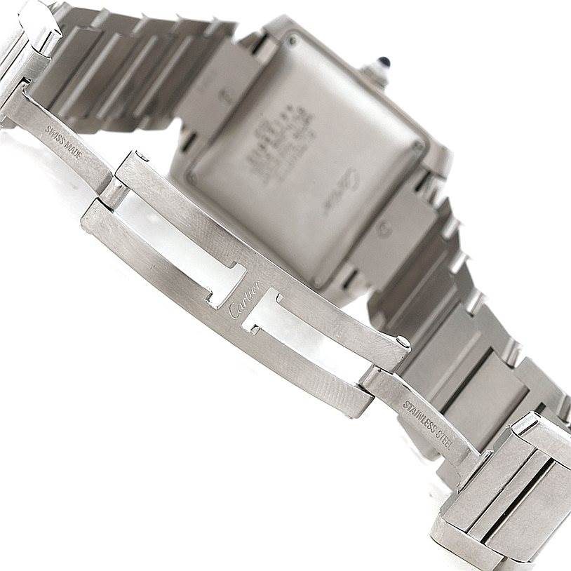 The image shows the backside and the bracelet of a Cartier Tank Francaise W51002Q3 Men's Stainless Steel Silver Dial W51002Q3 Men's Stainless Steel Silver Dial watch, highlighting its clasp and stainless steel links.