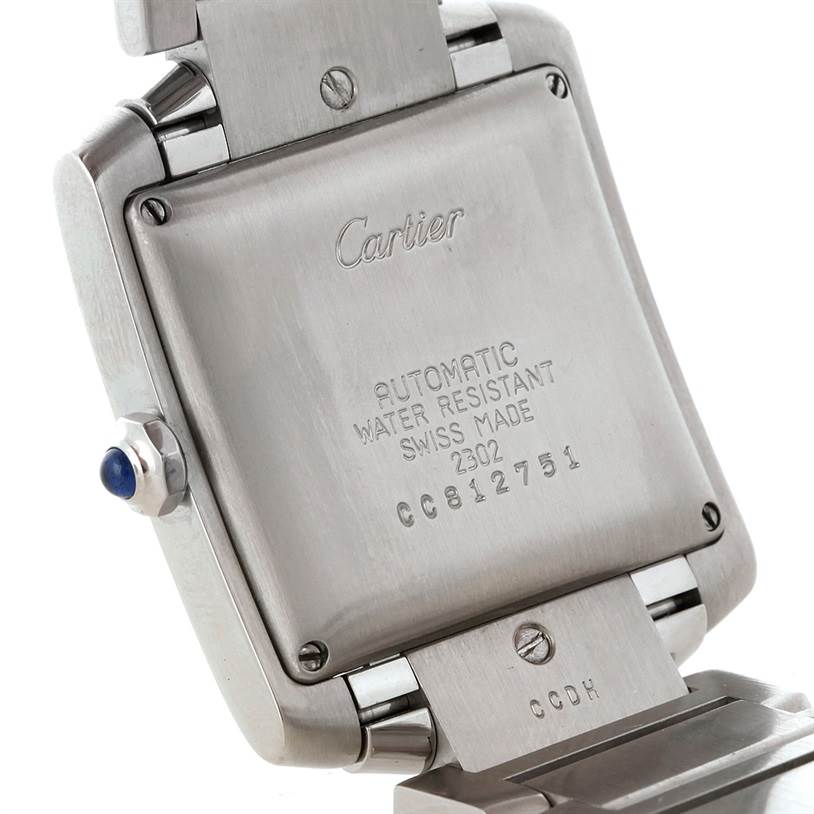 The image shows the back case of a Cartier Tank Francaise W51002Q3 Men
s Stainless Steel Silver Dial W51002Q3 Men
s Stainless Steel Silver Dial watch, highlighting the engraved details and part of the bracelet.
