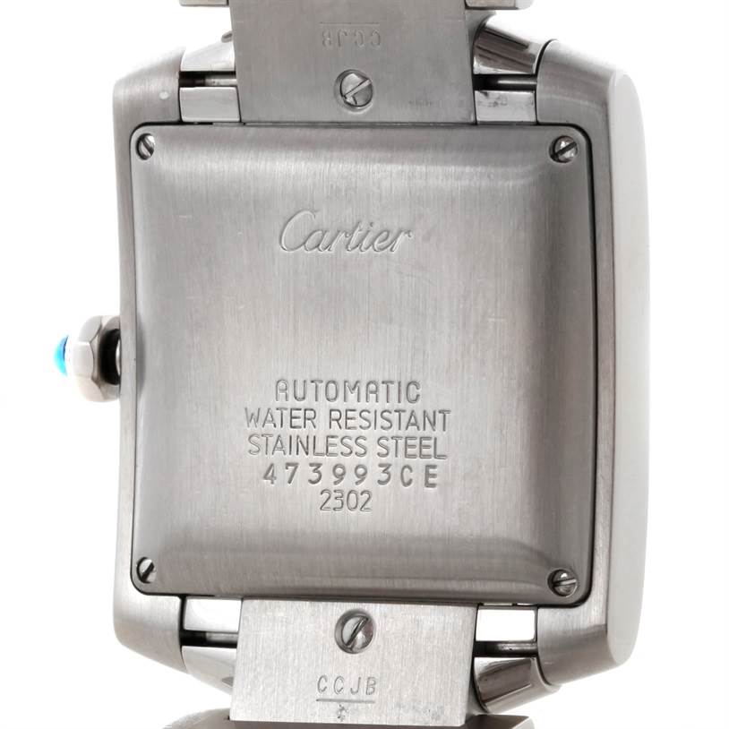 The image shows the back case of a Cartier Tank Francaise W51002Q3 Men's Stainless Steel Silver Dial W51002Q3 Men's Stainless Steel Silver Dial watch, highlighting the engravings and stainless steel material.