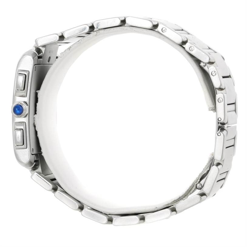 The image shows a side view of a Tank Francaise watch by Cartier, highlighting its metal bracelet and crown with a blue cabochon.