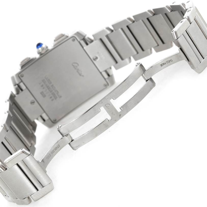 This image shows the back view of a Tank Francaise model by Cartier, highlighting the stainless steel bracelet and clasp.