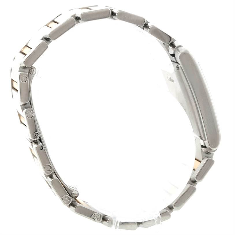 The image shows a side profile of a Cartier Tank Francaise W51005Q4 Steel and Gold (two tone) Silver Dial W51005Q4 Steel and Gold (two tone) Silver Dial watch, highlighting its link bracelet and case side.