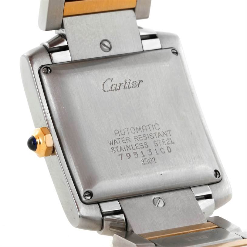 The image shows the case back and part of the bracelet of a Cartier Tank Francaise W51005Q4 Steel and Gold (two tone) Silver Dial W51005Q4 Steel and Gold (two tone) Silver Dial watch.