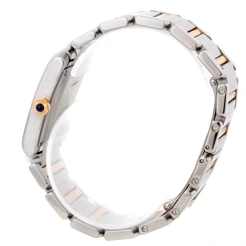 The image shows a side view of the Cartier Tank Française watch, highlighting the bracelet and crown.