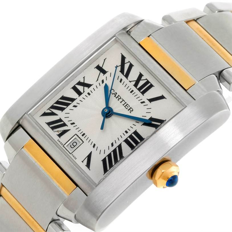 The image shows a close-up angle of a Cartier Tank Francaise W51005Q4 Steel and Gold (two tone) Silver Dial W51005Q4 Steel and Gold (two tone) Silver Dial watch, highlighting its silver and gold bracelet, face, and crown.