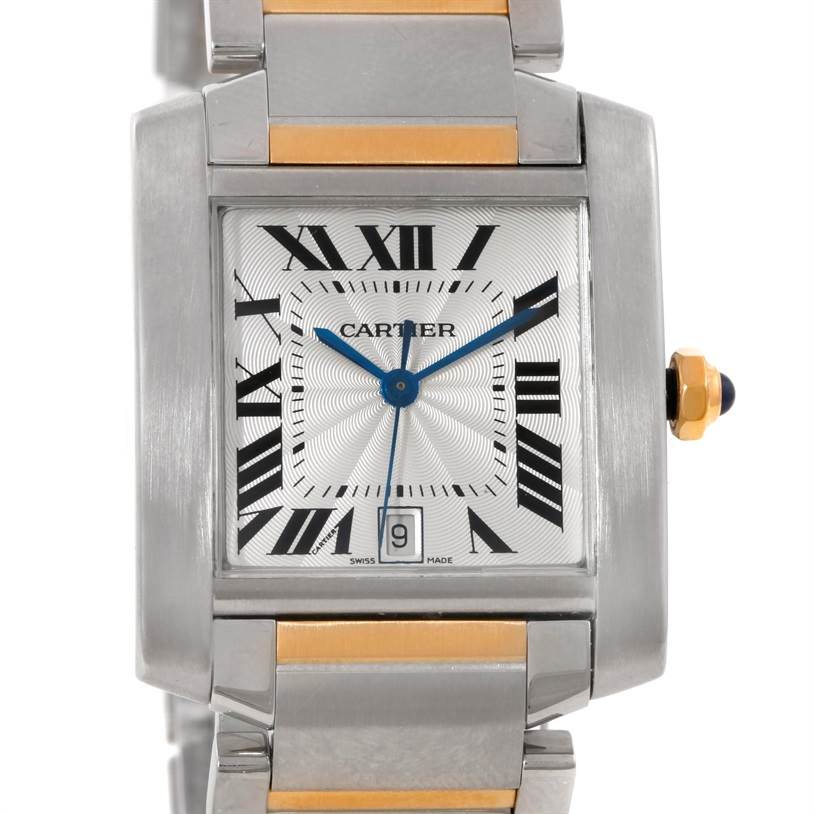 The image shows a front view of the Cartier Tank Francaise W51005Q4 Men's Steel and Gold (two tone) Silver Dial W51005Q4 Men's Steel and Gold (two tone) Silver Dial watch, highlighting the dial, Roman numerals, blue hands, and part of the bracelet.