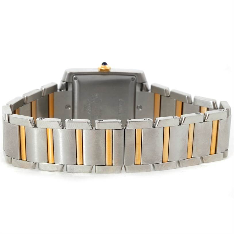 The image shows the back and bracelet of a Cartier Tank Francaise W51005Q4 Men's Steel and Gold (two tone) Silver Dial W51005Q4 Men's Steel and Gold (two tone) Silver Dial watch, highlighting its two-tone metal links.