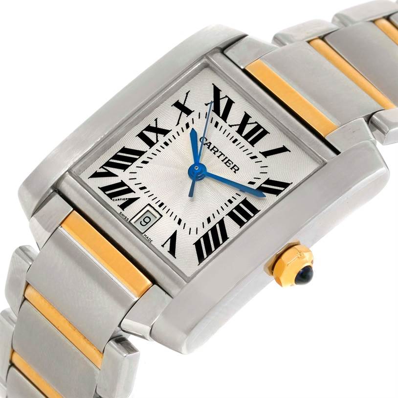 The image shows a close-up, angled view of the Cartier Tank Française watch face, including the dial, blue hands, and part of the bracelet.
