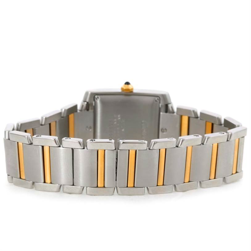 The image shows the back view of a Cartier Tank Francaise W51005Q4 Men
s Steel and Gold (two tone) Silver Dial W51005Q4 Men
s Steel and Gold (two tone) Silver Dial watch, highlighting its two-tone bracelet and caseback.