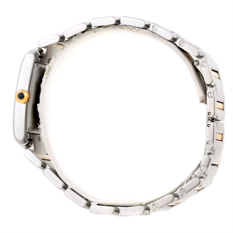 The image shows the side view of a Cartier Tank Française watch, highlighting the bracelet and crown.