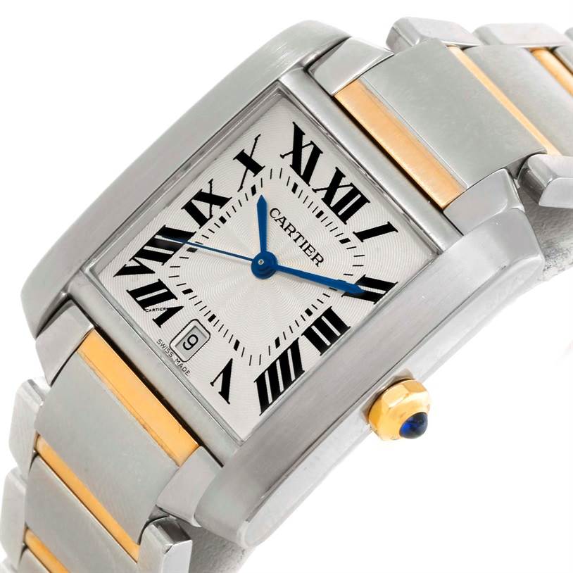 The Cartier Tank Francaise W51005Q4 Men's Steel and Gold (two tone) Silver Dial W51005Q4 Men's Steel and Gold (two tone) Silver Dial watch is shown at an angled close-up, highlighting the face, blue hands, date window, and part of the two-tone bracelet.