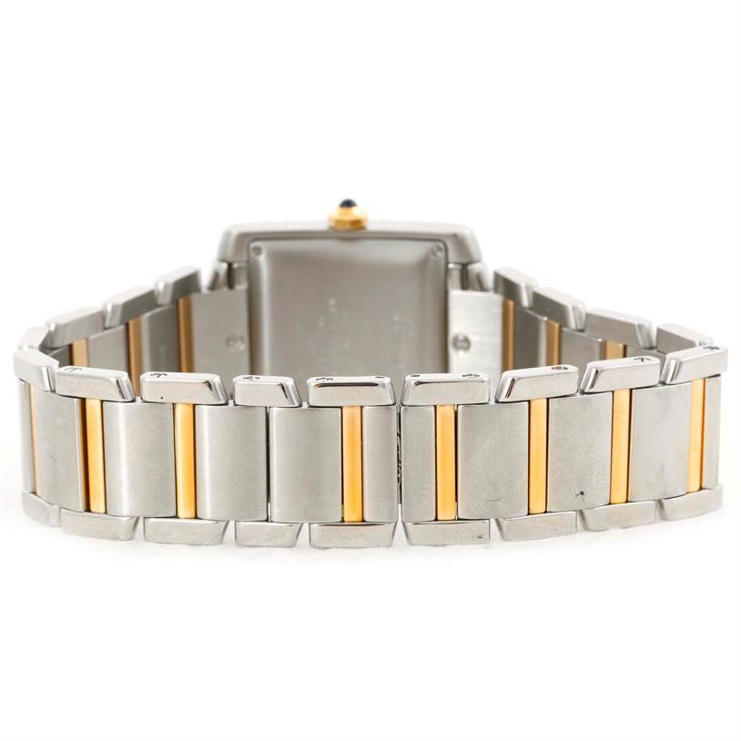 The image shows the back view of a Cartier Tank Francaise W51005Q4 Men's Steel and Gold (two tone) Silver Dial W51005Q4 Men's Steel and Gold (two tone) Silver Dial watch, focusing on its two-tone metal bracelet.