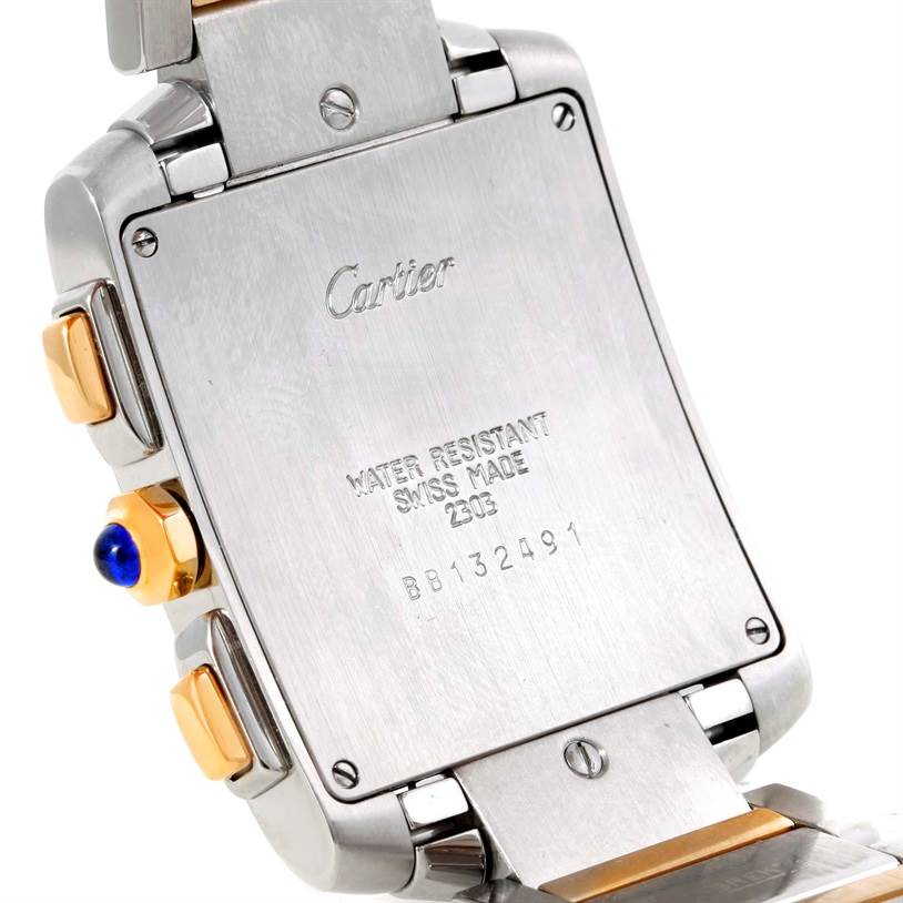 The image shows the back casing of a Cartier Tank Francaise W51004Q4 Men
s Steel and Gold (two tone) Silver Dial W51004Q4 Men
s Steel and Gold (two tone) Silver Dial watch, including water resistance markings and side buttons.