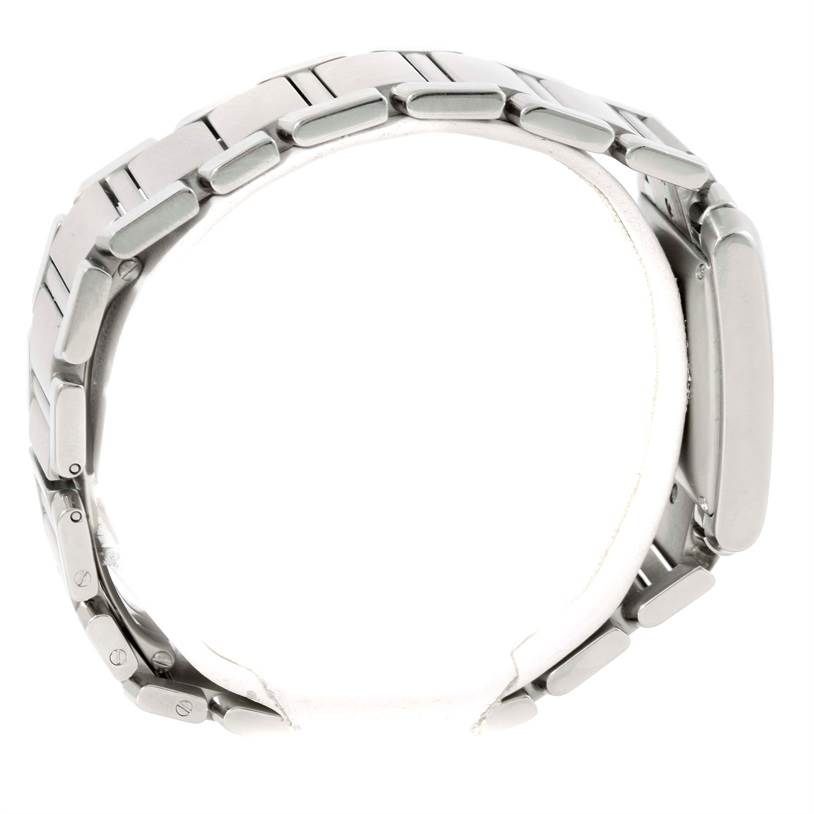 The image shows a side view of the Cartier Tank Française watch focusing on the metal bracelet and case.