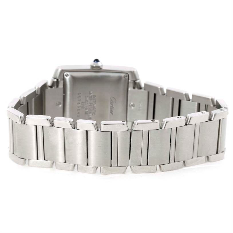 The image shows the back view of a Cartier Tank Francaise W51002Q3 Men
s Stainless Steel Silver Dial W51002Q3 Men
s Stainless Steel Silver Dial watch, focusing on the bracelet and case back.