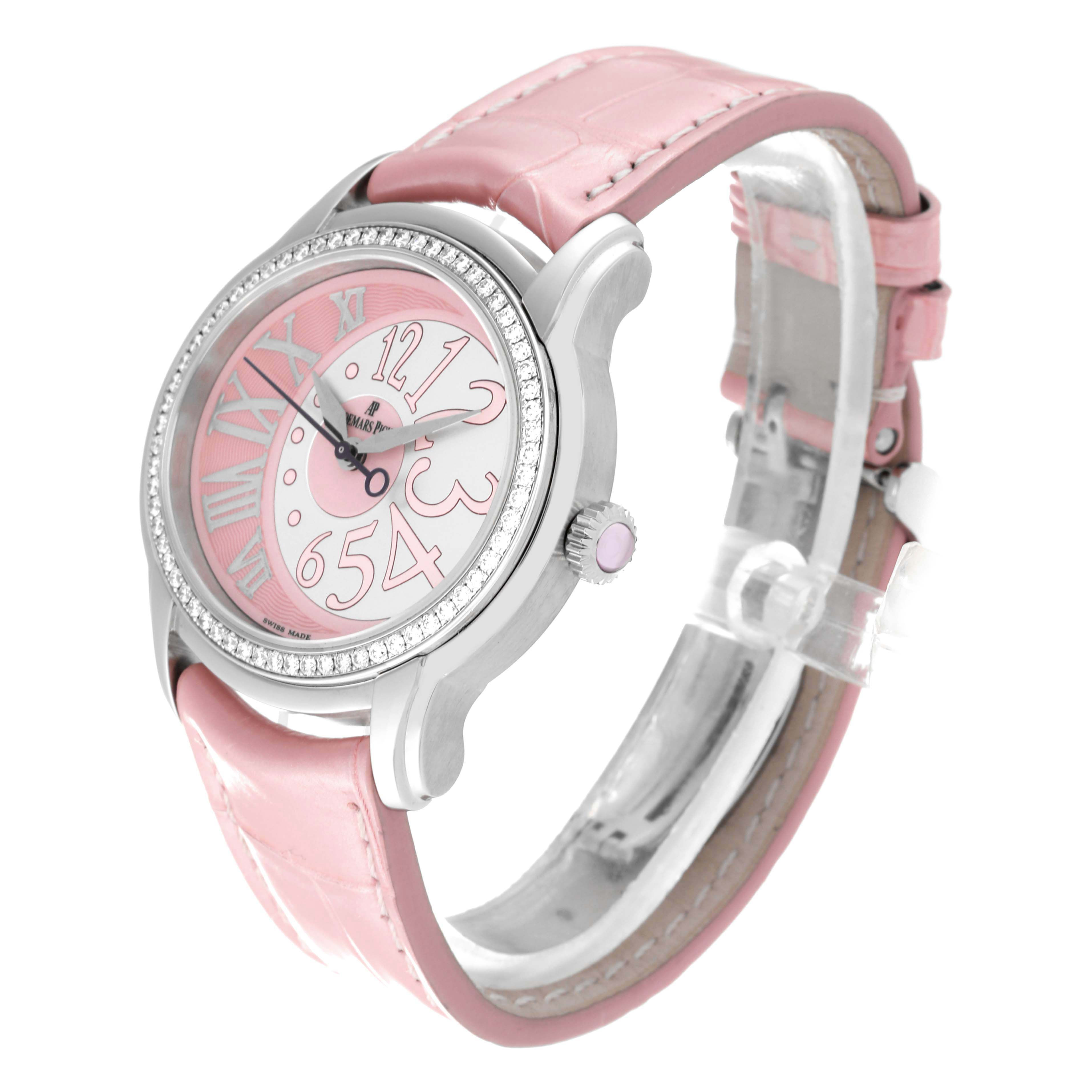 The image shows a pink Audemars Piguet Millenary 77301ST Women's Stainless Steel Pink Dial 77301ST Women's Stainless Steel Pink Dial watch at an angled view, highlighting the dial, bezel, crown, and strap.