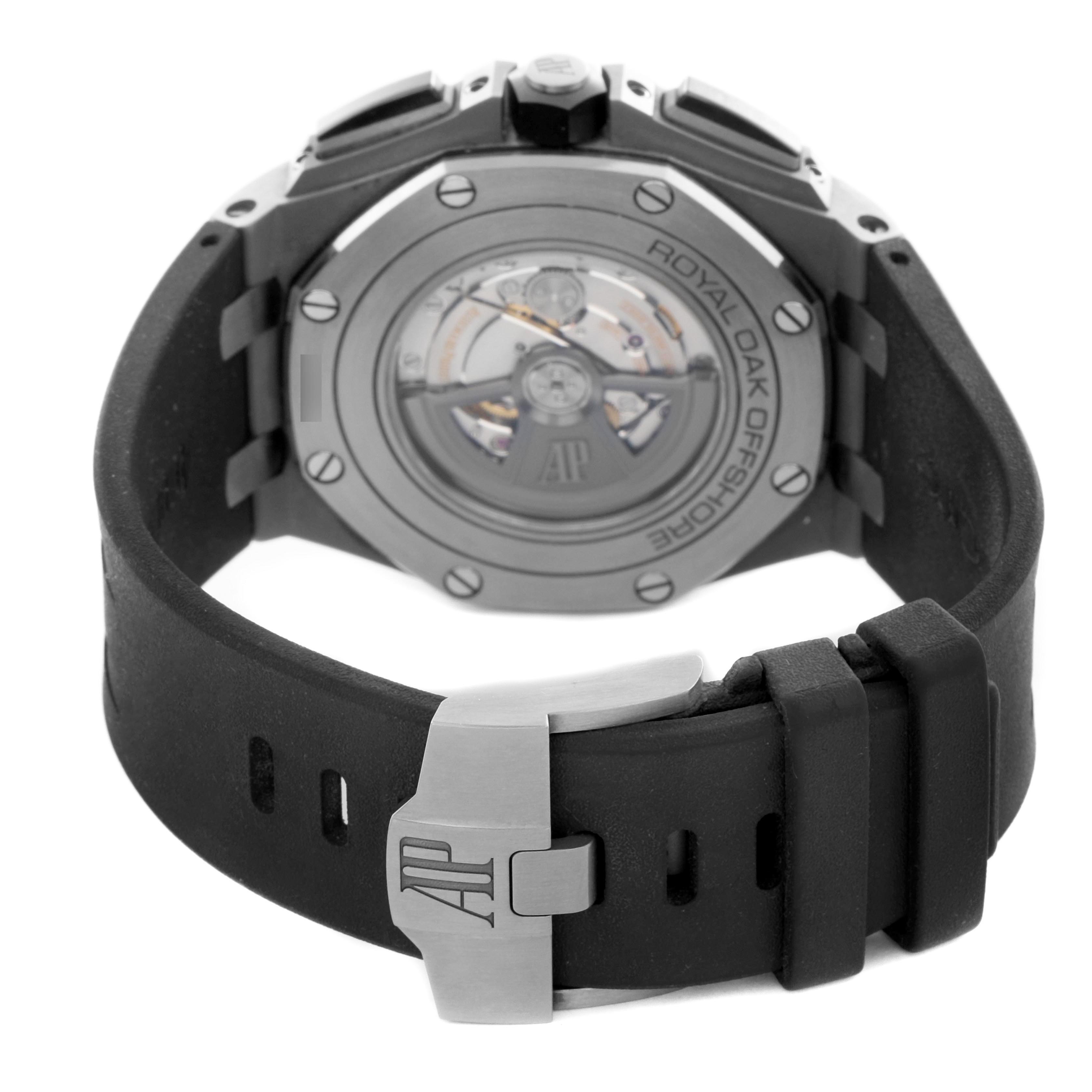 The image shows the back view of the Audemars Piguet Royal Oak Offshore 26400IO.OO.A004CA.01 Men's Titanium Grey Dial 26400IO.OO.A004CA.01 Men's Titanium Grey Dial, highlighting the case back, strap, and clasp.