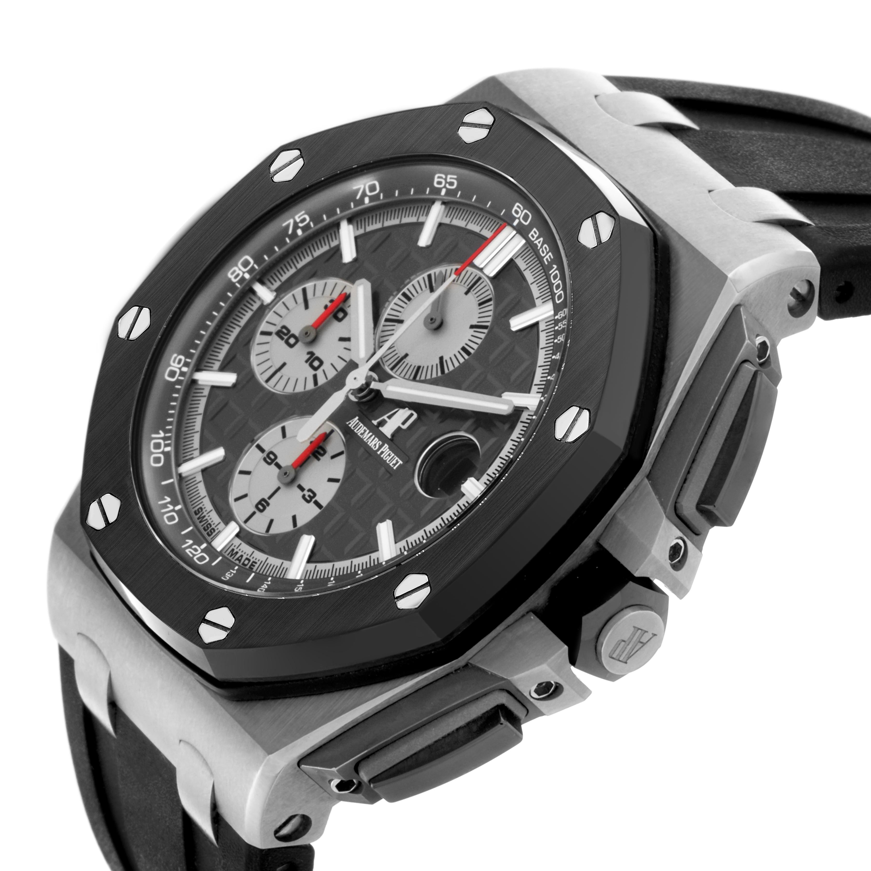 The image shows an angled view of the Audemars Piguet Royal Oak Offshore 26400IO.OO.A004CA.01 Men's Titanium Grey Dial 26400IO.OO.A004CA.01 Men's Titanium Grey Dial, highlighting the dial, bezel, and side pushers.