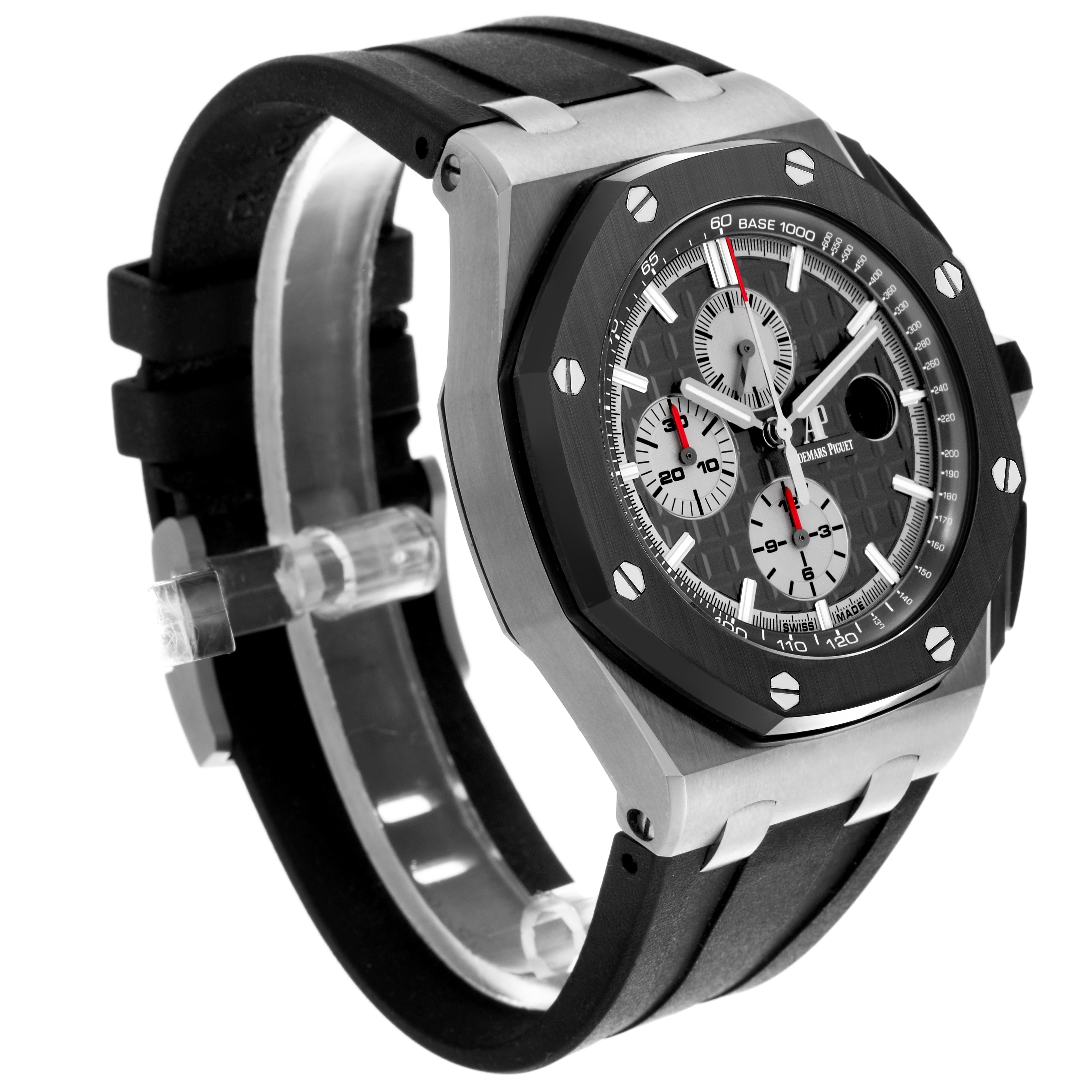 The Audemars Piguet Royal Oak Offshore 26400IO.OO.A004CA.01 Men's Titanium Grey Dial 26400IO.OO.A004CA.01 Men's Titanium Grey Dial watch is shown at an angled side view, highlighting its case, bezel, and strap.