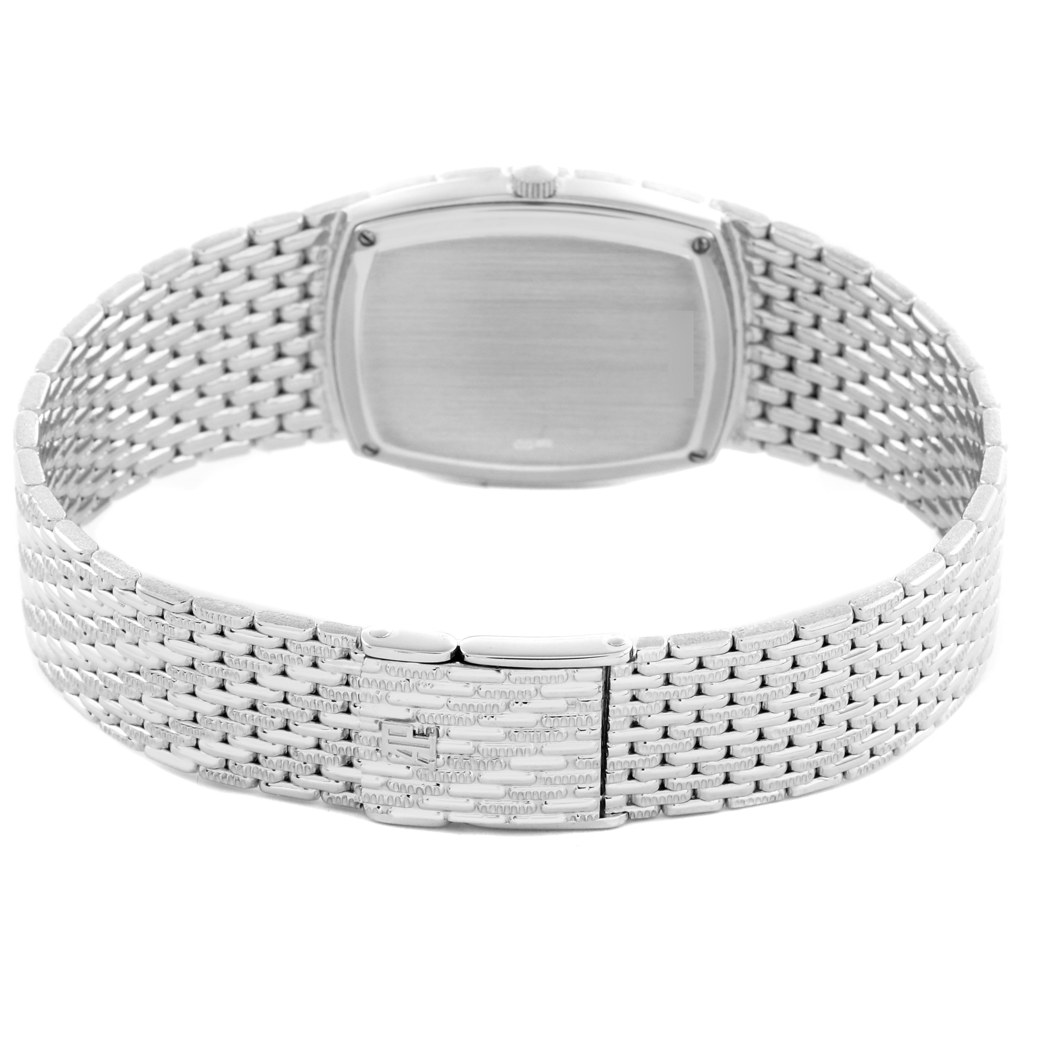 The image shows the back view of a Vintage Audemars Piguet watch, focusing on its case back and metal bracelet.