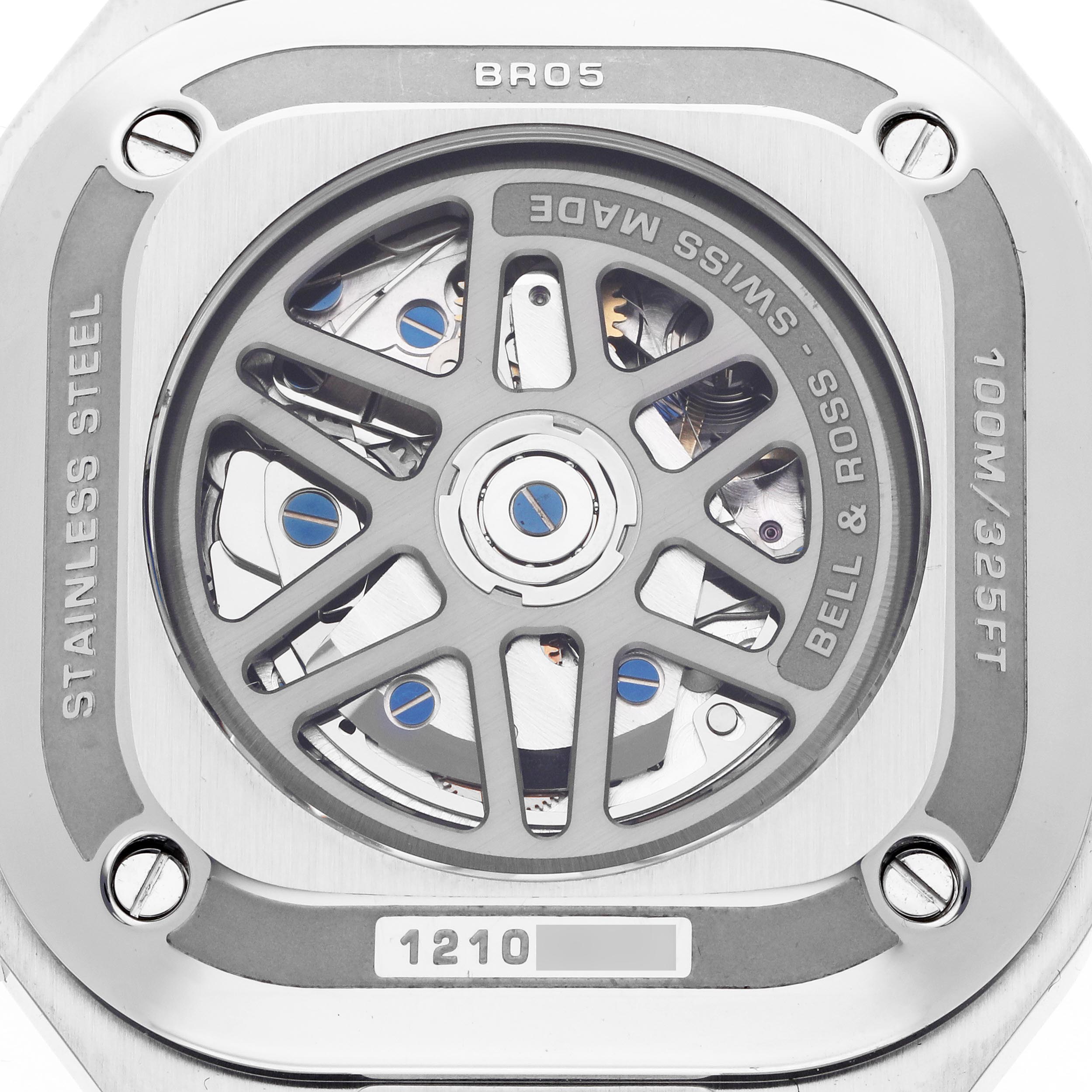The image shows the back of a Bell 
Ross Urban BR05C-BLC-ST/SST Men
s Stainless Steel Black Dial BR05C-BLC-ST/SST Men
s Stainless Steel Black Dial BR05 watch, highlighting the movement and rotor through a transparent case back.