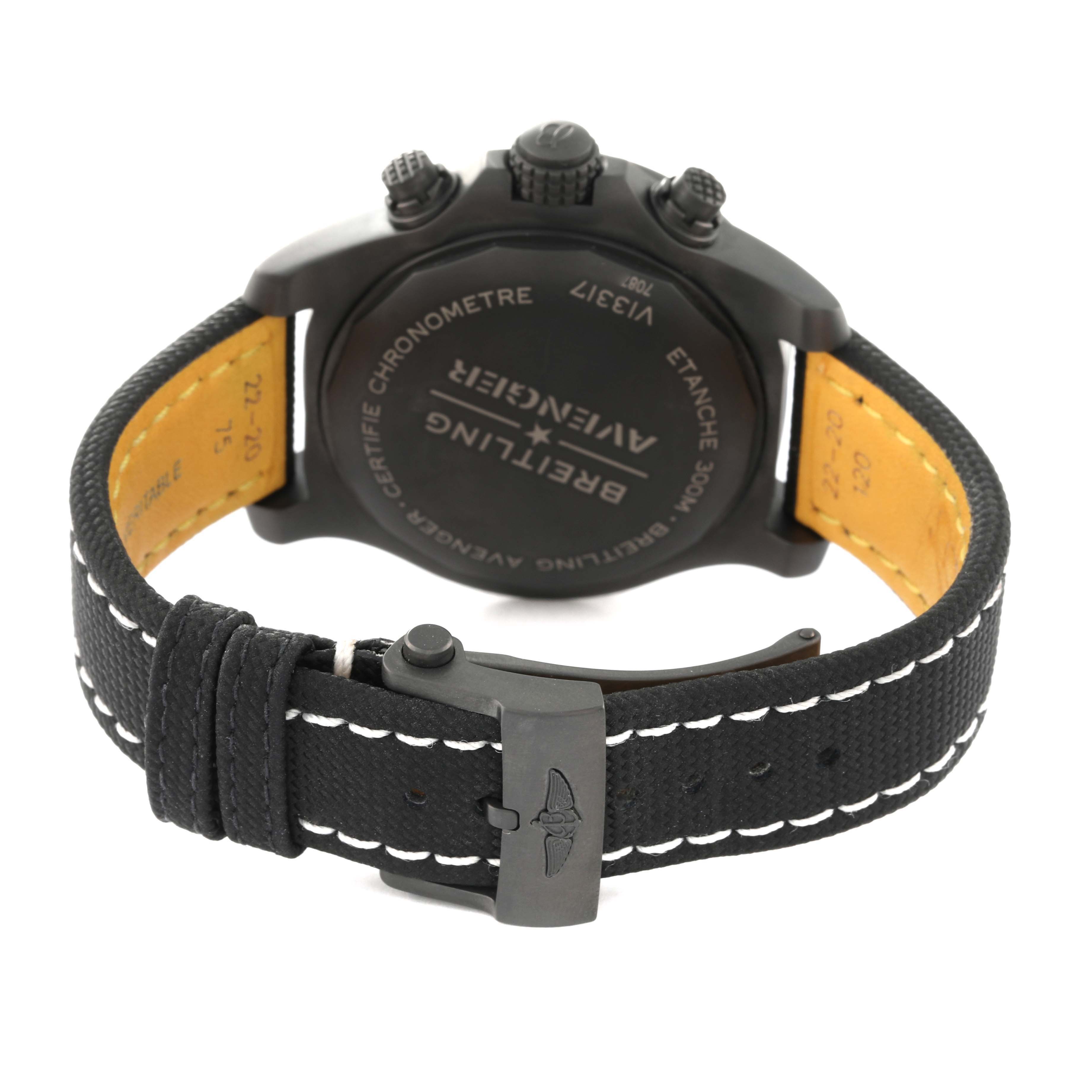 The image shows the back of a Breitling Avenger V13317 Men's Titanium Black Dial V13317 Men's Titanium Black Dial watch, highlighting the case back and black strap with a buckle.