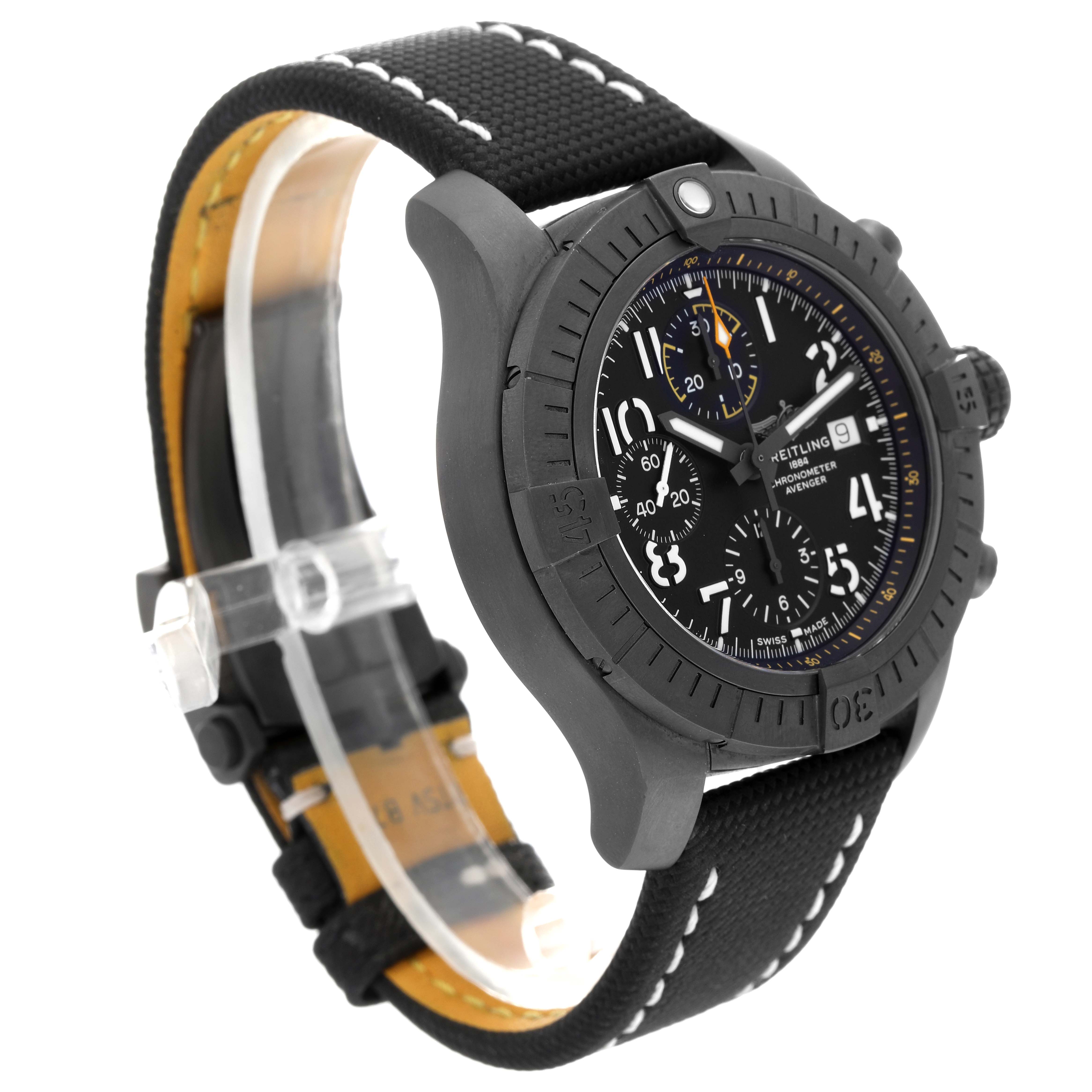 The image shows a Breitling Avenger V13317 Men's Titanium Black Dial V13317 Men's Titanium Black Dial watch from a three-quarter angle, highlighting its black dial, bezel, and strap with white stitching.
