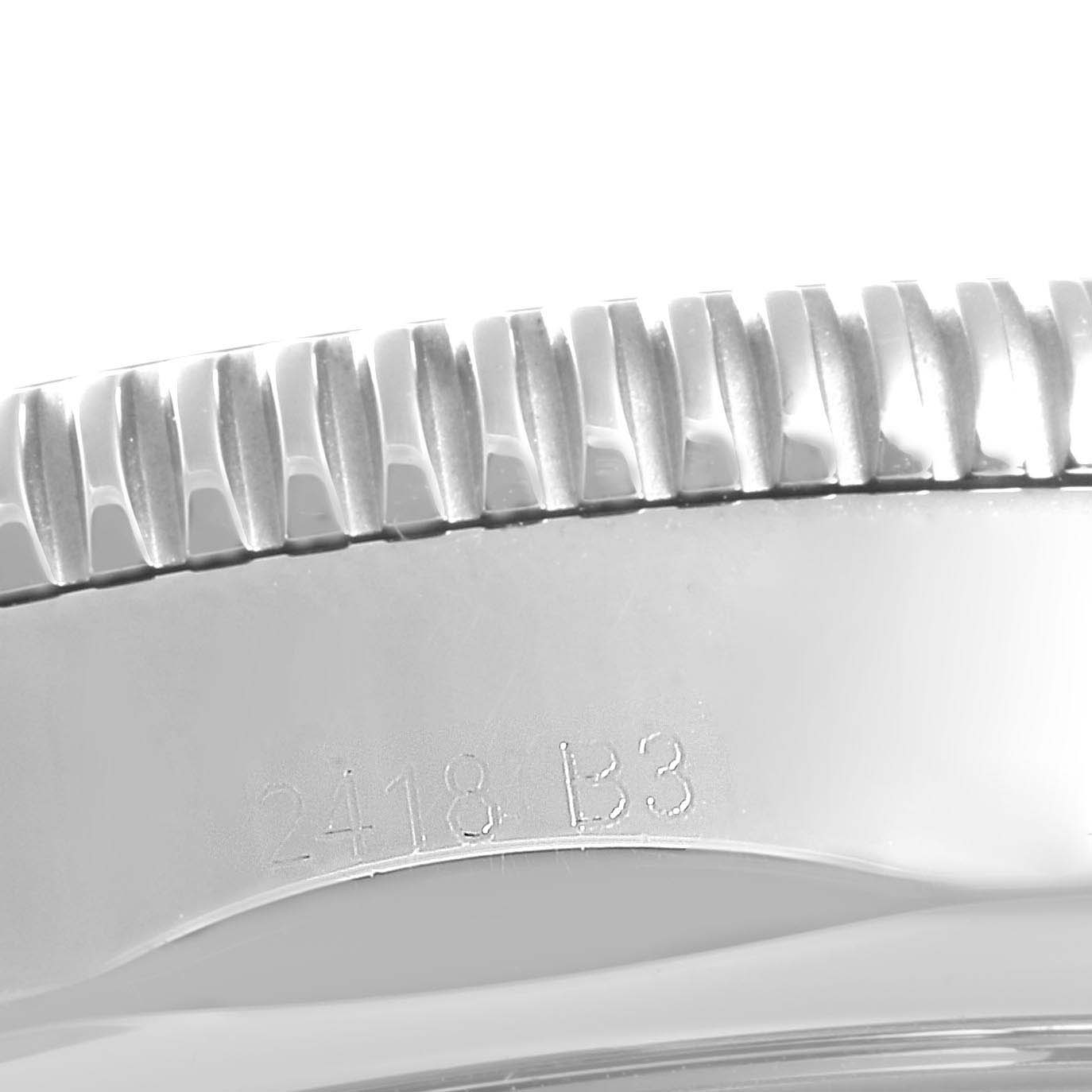 The image shows a close-up of the bezel and part of the case of the Breitling Superocean AB202016-C961-152A Men
s Stainless Steel Blue Dial AB202016-C961-152A Men
s Stainless Steel Blue Dial watch.