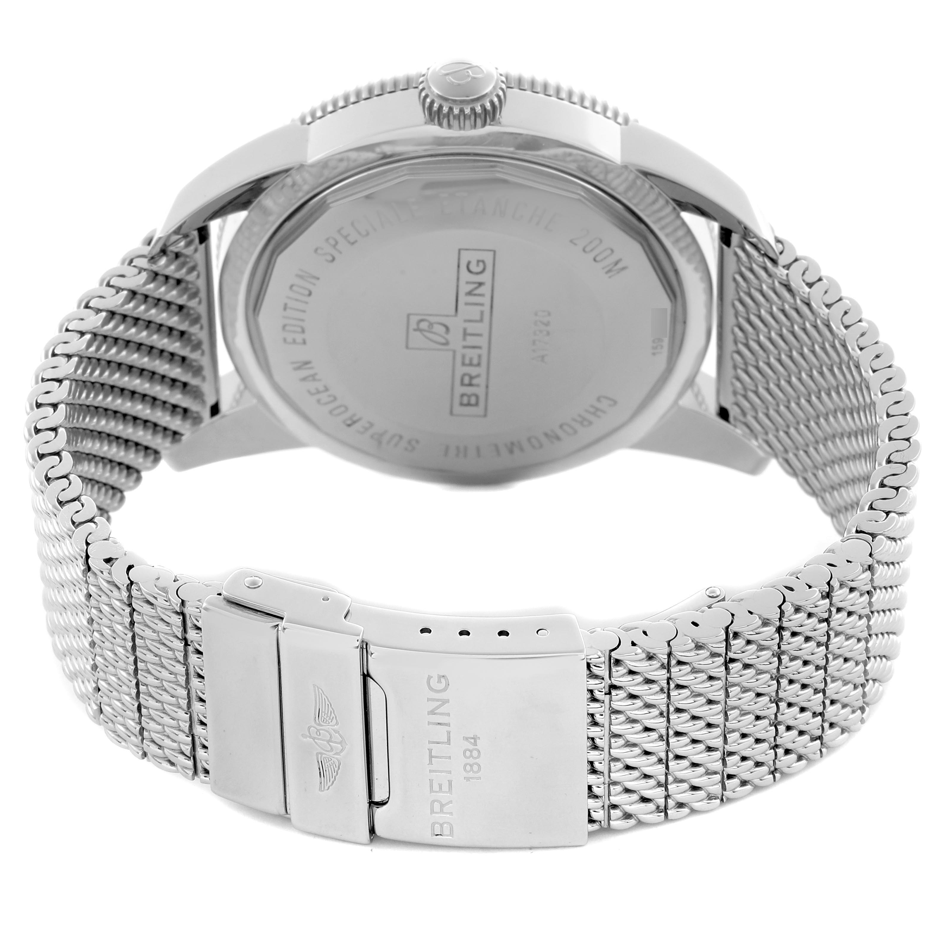 The image shows the back of a Breitling Superocean A1732024/G642 Men's Stainless Steel Silver Dial A1732024/G642 Men's Stainless Steel Silver Dial watch, focusing on the case back, mesh bracelet, and clasp.