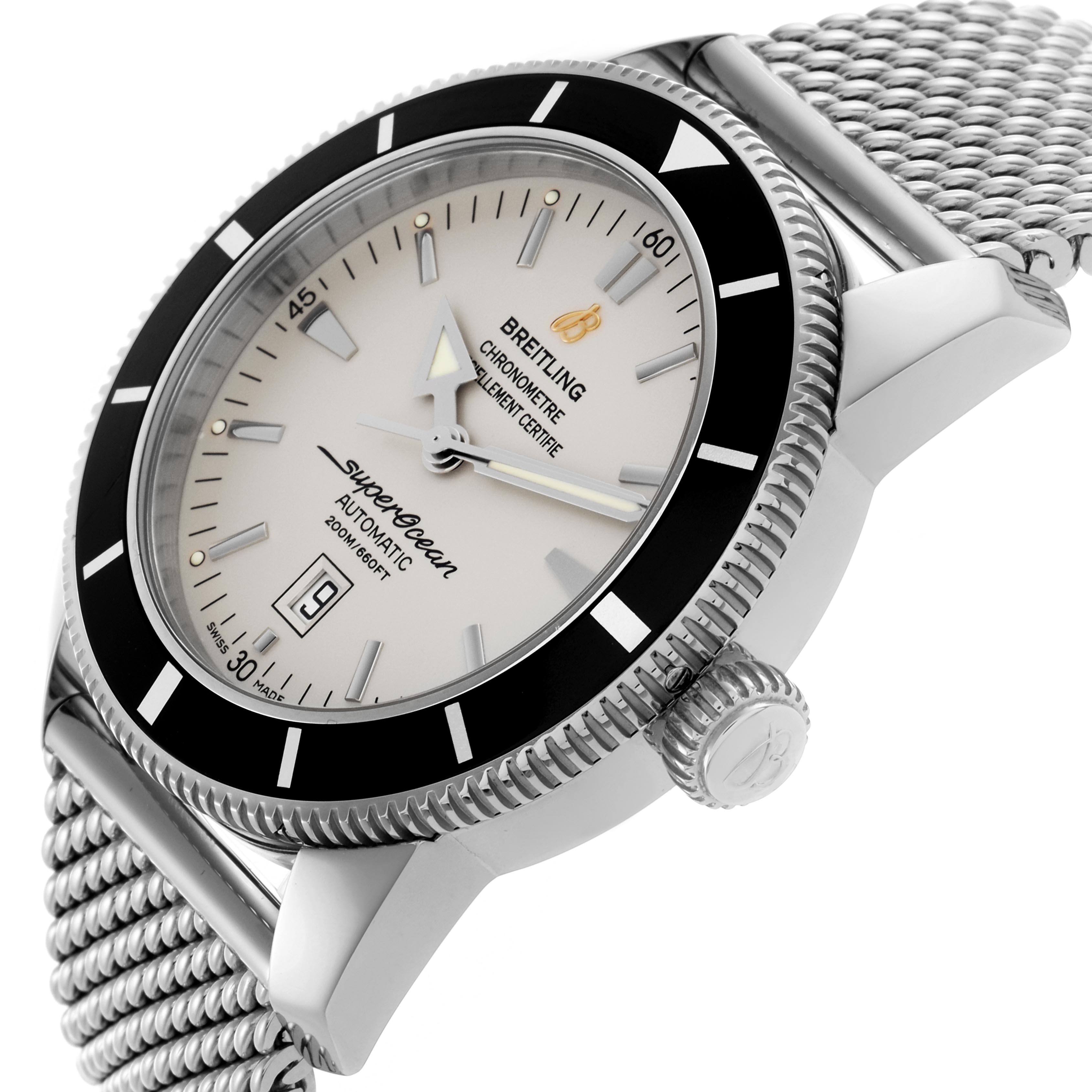 The Breitling Superocean A1732024/G642 Men's Stainless Steel Silver Dial A1732024/G642 Men's Stainless Steel Silver Dial watch is shown from a side angle, highlighting the bezel, crown, dial, and mesh bracelet.