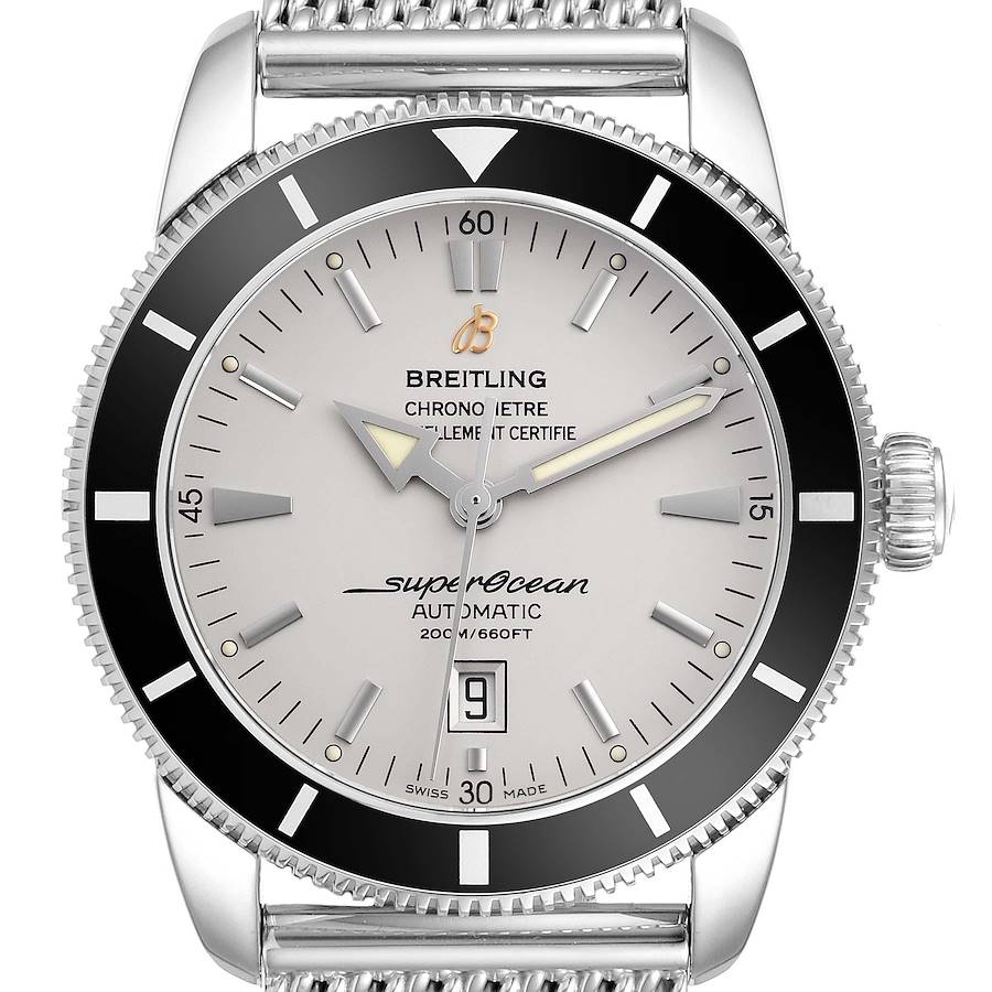 The Breitling Superocean watch is shown from a front angle, highlighting the dial, bezel, and crown.