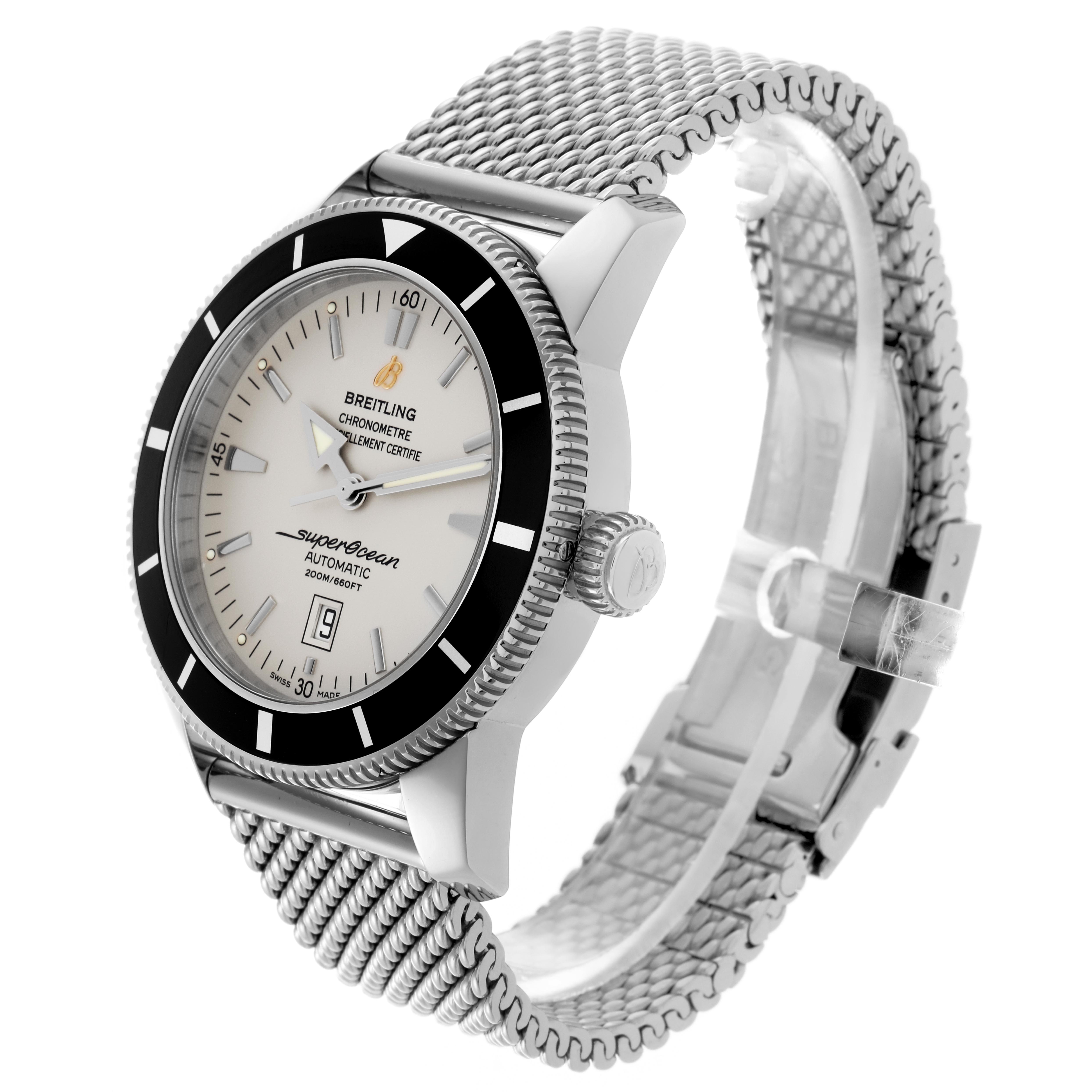 The Breitling Superocean A1732024/G642 Men's Stainless Steel Silver Dial A1732024/G642 Men's Stainless Steel Silver Dial watch is shown at an angled side view, highlighting the bezel, dial, crown, and mesh bracelet.
