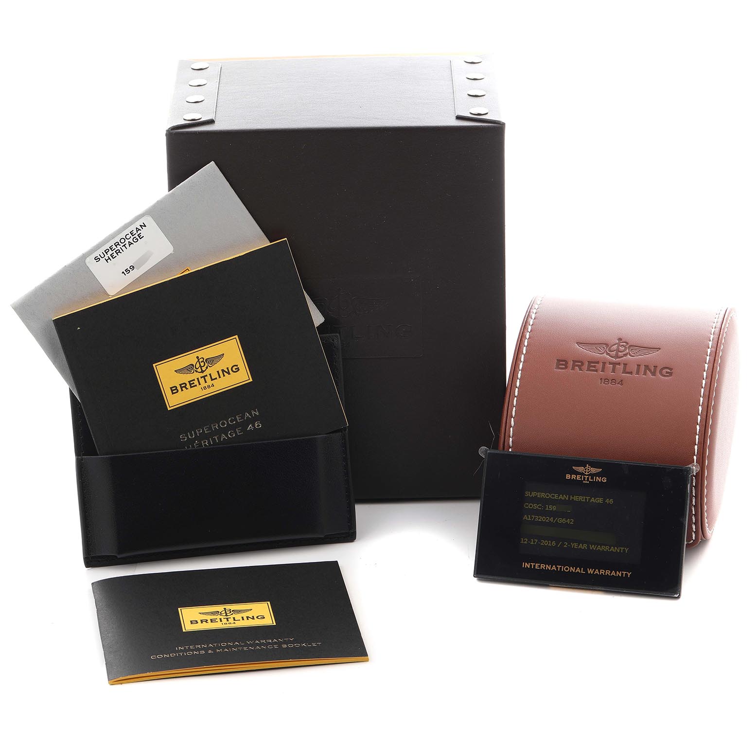 The image shows accessories for the Breitling Superocean A1732024/G642 Men's Stainless Steel Silver Dial A1732024/G642 Men's Stainless Steel Silver Dial model, including warranty cards, manuals, a leather pouch, and packaging.