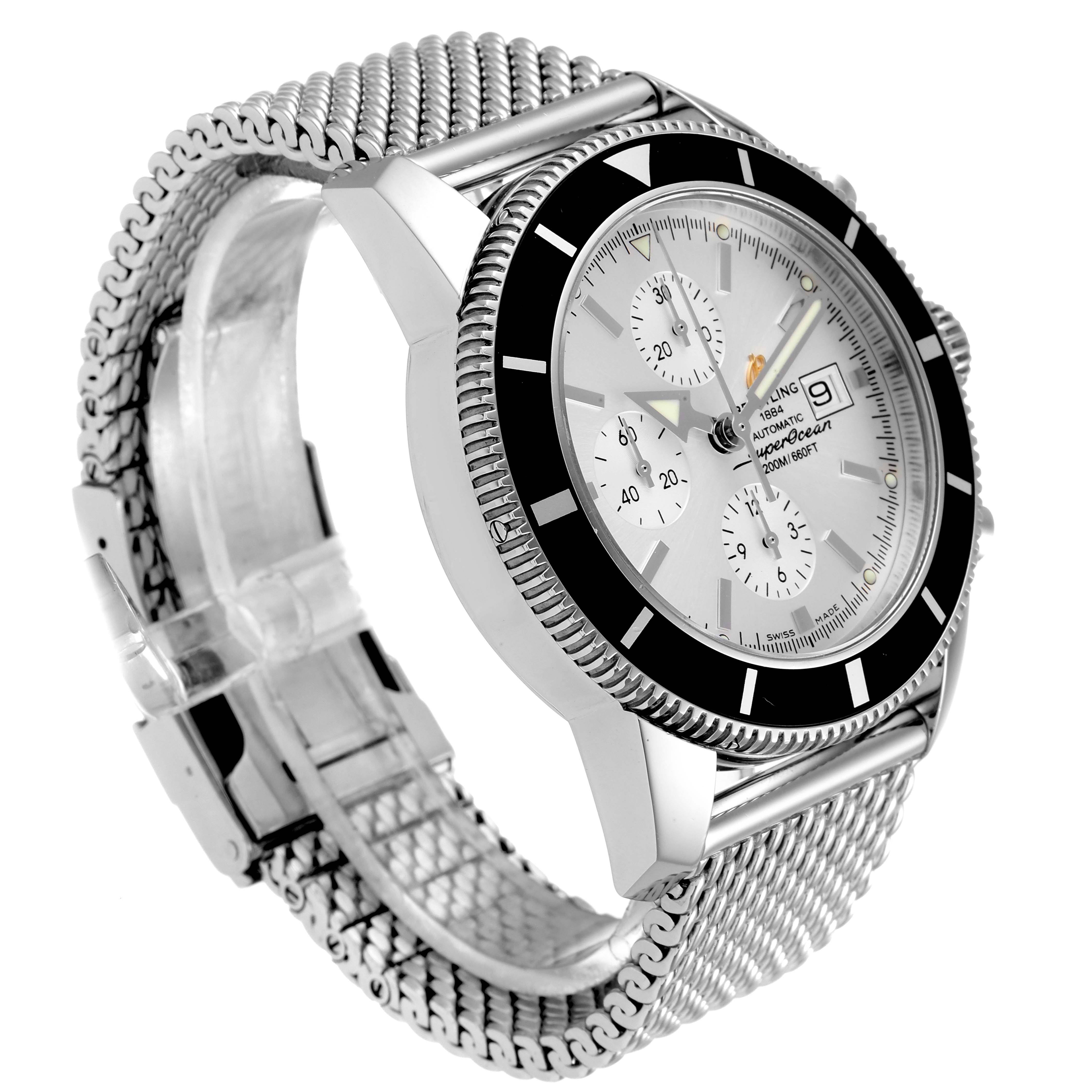 The image shows a side angle of the Breitling Superocean A13320 Men's Stainless Steel Silver Dial A13320 Men's Stainless Steel Silver Dial watch, highlighting the case, bezel, dial, and mesh bracelet.