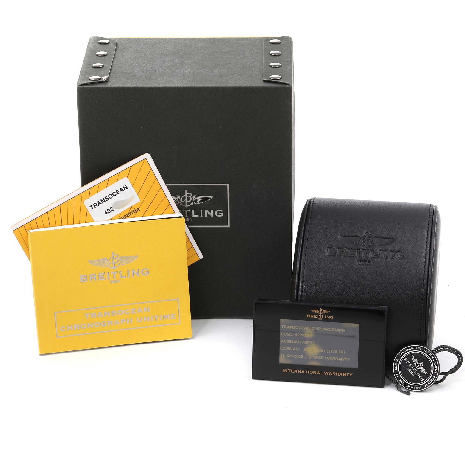 The image shows the packaging, warranty card, manual, and leather case for the Breitling Transocean AB0510 Men's Stainless Steel Black Dial AB0510 Men's Stainless Steel Black Dial model.