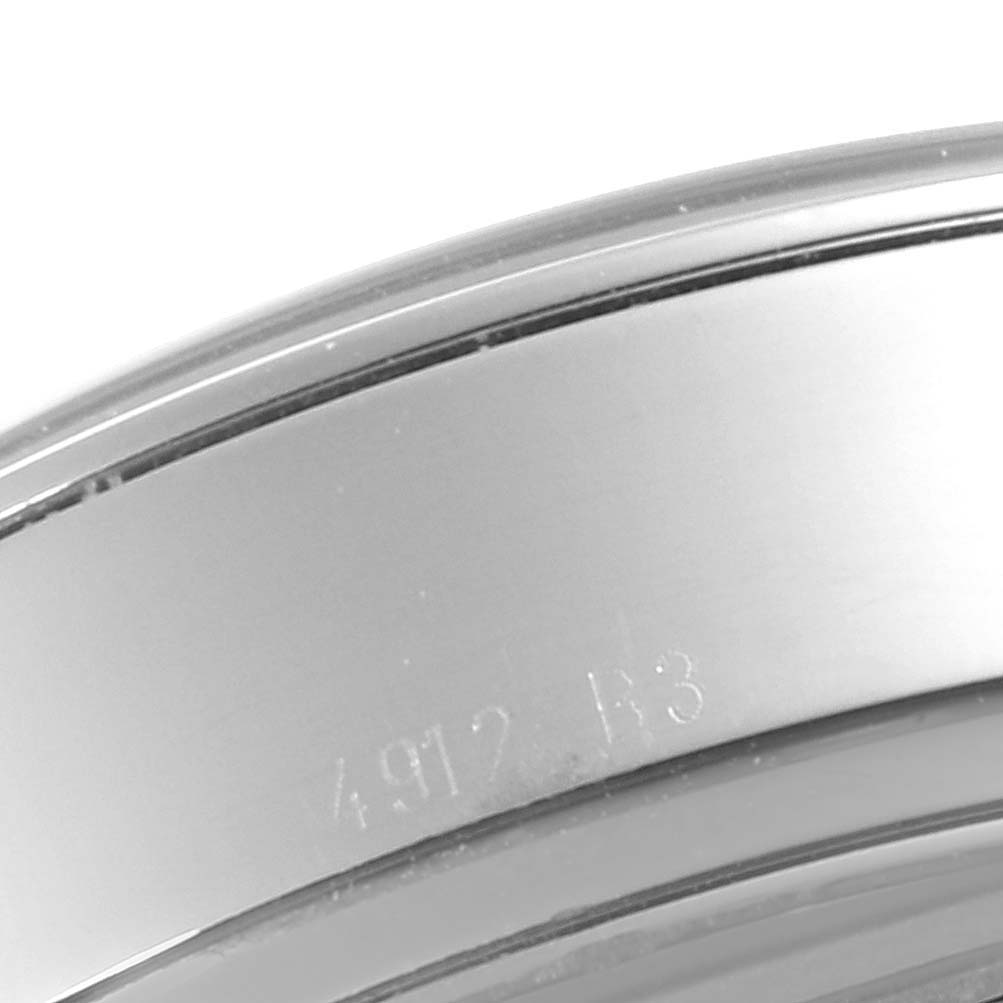 This image shows a close-up of the side casing of the Breitling Transocean AB0510 Men's Stainless Steel Black Dial AB0510 Men's Stainless Steel Black Dial watch.